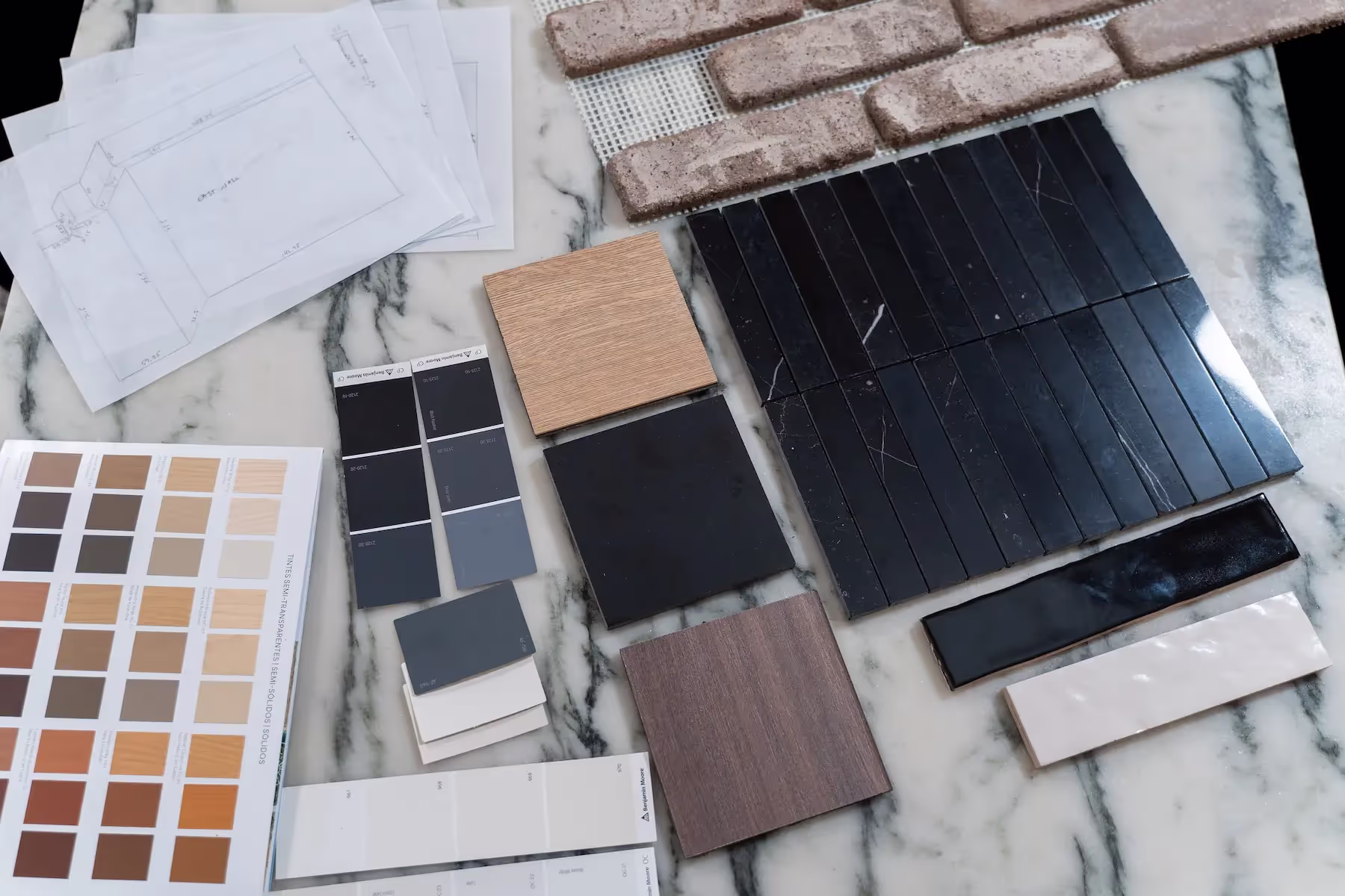 Photo of tiles, wall coverings, wood samples, and paint chips